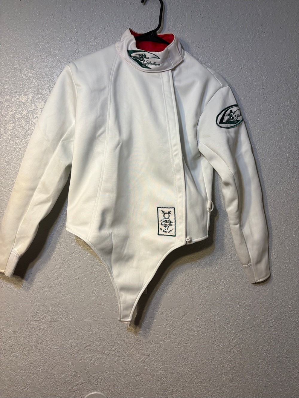 White Fencing Jacket with Green Emblems